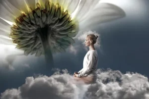 rostro de mujer iluminado con luces que simulan la energía del alma en un entorno espiritual
